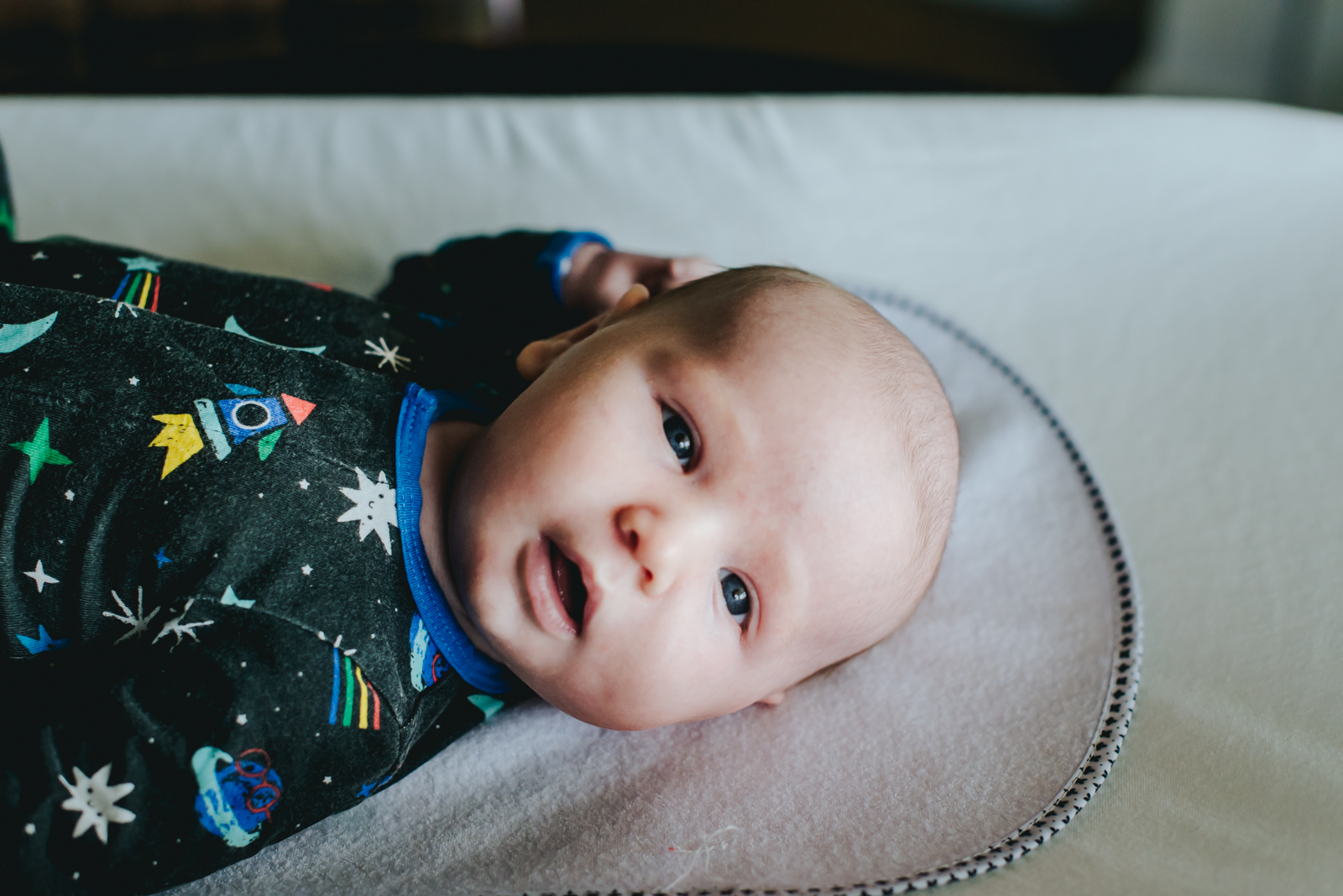 new baby looking at new mom